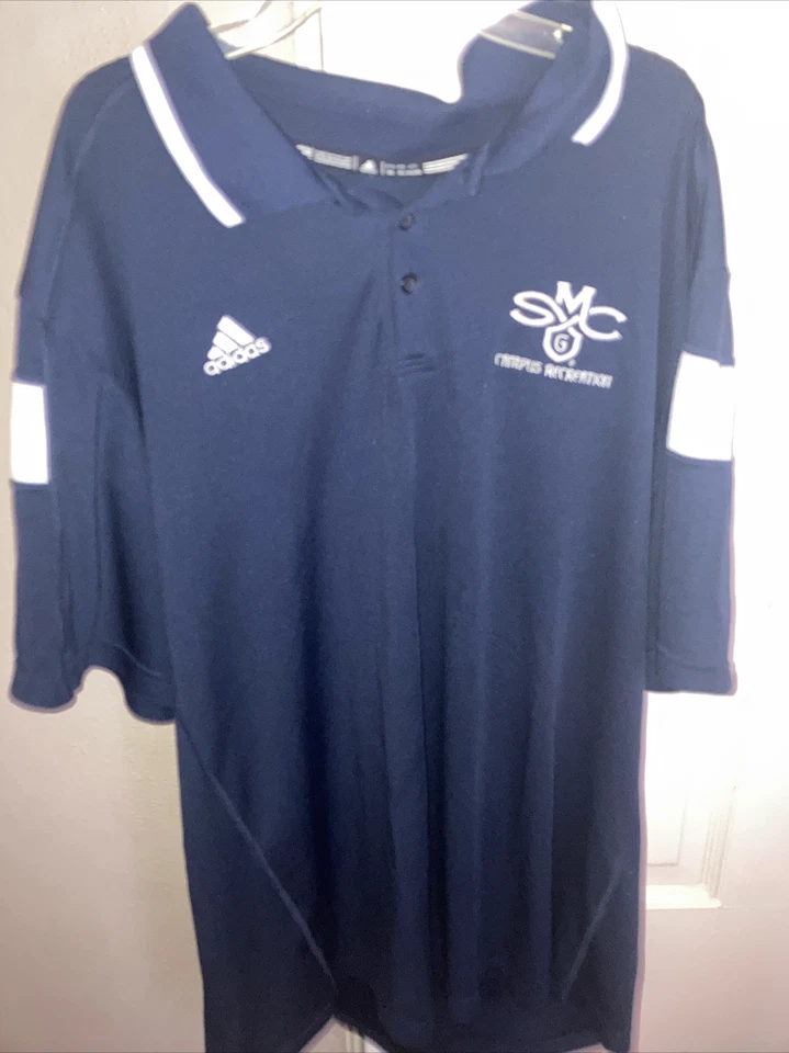 Polo Saint Mary’s College of California. Polo deportivo, malla elástica, Adidas. XL Foto 1 de 1