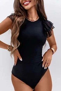 Body negro liso con volantes de malla con mangas de retazos - Imagen 1 de 8