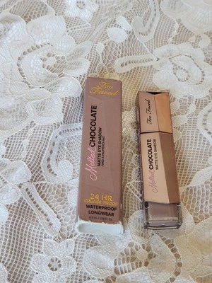 TAMBIÉN. CARA. Chocolate derretido. SOMBRA DE OJOS LÍQUIDA MATE, IMPERMEABLE, LARGA DURACIÓN Foto 1 de 2