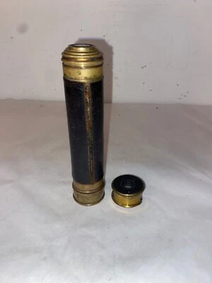 Longue vue à deux tirages en laiton doré gainé de cuir noir. - Photo 1/4