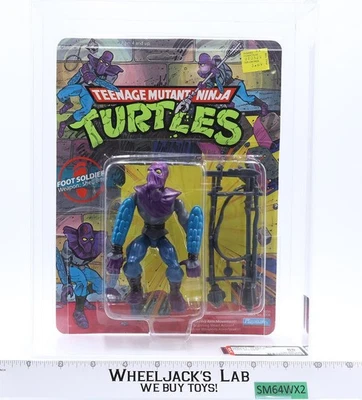 Foot Soldier AFA GRADUADO 85 85/85/90 TMNT 10-Back 1988 Playmates NUEVO SELLADO Foto 1 de 4