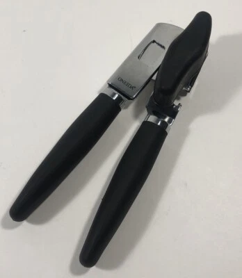 "Abridor de latas ONEIDA negro de acero inoxidable manual de silicona negro calidad 7-1/2"" usado en excelente estado" Foto 1 de 4