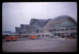 Coches aeropuerto St Louis camiones aviones 35 mm extensión años 50 Kodachrome - Imagen 1 de 3