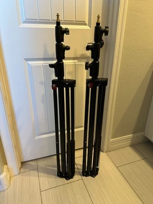 (2) Dos soportes de luz maestra de aluminio con amortiguación de aire Manfrotto 1004BAC Foto 1 de 4