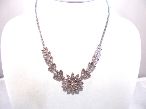 VETEMENTS Collana fiori e foglie con strass trasparenti tono argento spedizione gratuita