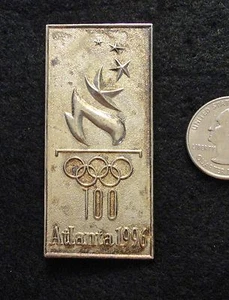 NEW ~ JUMBO 2.5 Inch SILVER Olympic Torch Logo 1996 Games Lapel Pin -Tarnished - Picture 1 of 1