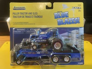 NEW HOLLAND 1:64 NEW HOLLAND BLUE BLAZES! ERTL TRACTOR & SLED NIP RARE HTF - Picture 1 of 9