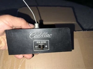 1971-73 CADILLAC OEM REAR DEFOG  SWITCH WITH BEZEL AND WIRE HARNESS - Picture 1 of 6