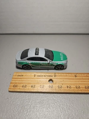 Matchbox MBX Heroic Rescue (2014) BMW M5 verde policía y plata 53/120 limpio  Foto 1 de 4