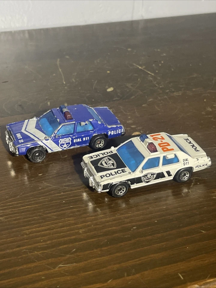 Lot Of 2 Vintage 1987 Matchbox Ford LTD Police Cars White Pd-22 And Blue Unit-22 - Image 1 of 4