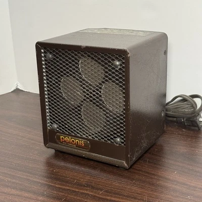 Aquecedor de disco de cerâmica Pelonis Safe-T modelo forno P-861-TC/VHC 1500W - Funcionando - Imagem 1 de 4