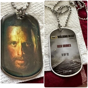 Waking Dead Dog Tags 13 Pieces  Includes   2 Hologram 1 With Piece Of Clothing￼ - Picture 1 of 7