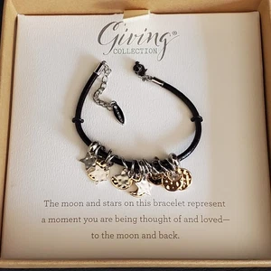 Pulsera Demdaco Giving Collection Cuero Negro Tono Plata y Dorado Lunas - Imagen 1 de 7