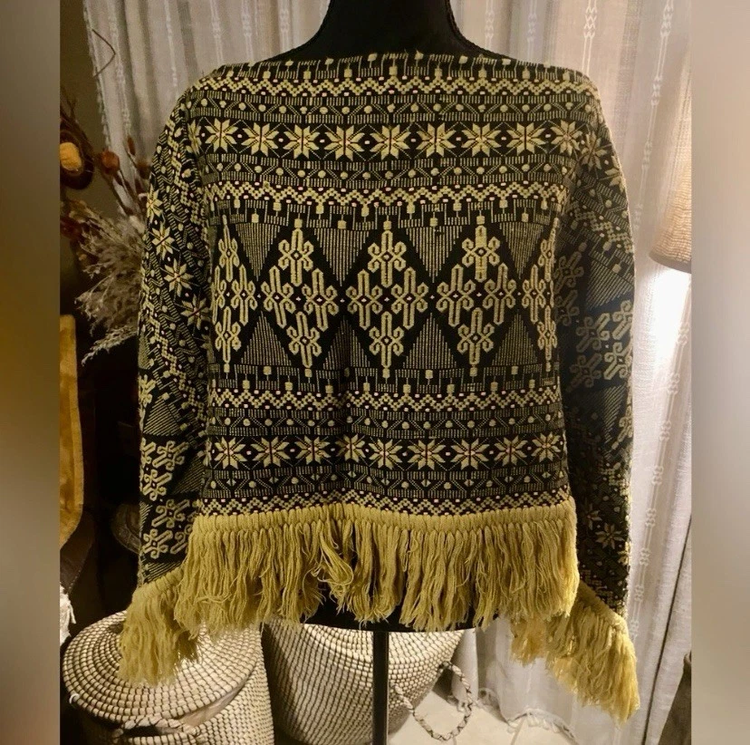 Poncho vintage años 70 estampado negro y amarillo Foto 1 de 4