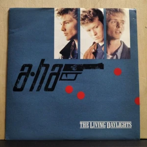 45 giri A-HA - THE LIVING DAYLIGHTS + strumentale - VINILE NUOVO WEA 1987 - Foto 1 di 8