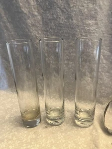 3 glass bud vases. Cylindar. 7.5 inches. Clear. No chips or cracks. One need - Picture 1 of 3