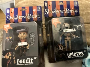 Set 2 Showdown Bandit Actionfiguren GRIEVES & BANDIT Neu Originalverpackt - Bild 1 von 6
