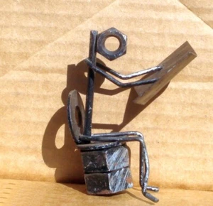 Student Reading Metal Nuts and Bolts Figurine 3" Tall - Bild 1 von 3