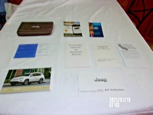 2017 JEEP COMPASS OWNER MANUAL 8 PC SET & JEEP SPORTY DENIM FACTORY CASE. OEM - Picture 1 of 6