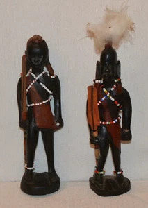 Dos figuras africanas, madera tallada, con remos en las manos, siglo XX. - Imagen 1 de 3