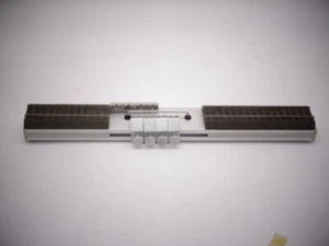 Banco de pruebas de rodillos Märklin HO 78100 con 4 pares de caballetes de rodillos -acortado--310 mm - Imagen 1 de 2