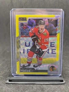 2020-21 OPC Platinum Neon Yellow Surge Jonathan Toews #142 Blackhawks - Picture 1 of 2