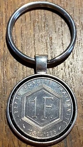 PIECE DE 1 FRANC 1988 MONTÉE EN PORTE CLEFS (1068) - Picture 1 of 2