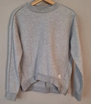 Nueva Sudadera Adidas Gris Pullover Dobladillo Alto/Bajo Para Mujer XS Foto 1 de 4