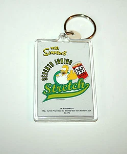 Portachiavi in plastica vintage I Simpsons cartone animato Homer Duff birra nuovo NOS 1999 - Foto 1 di 1