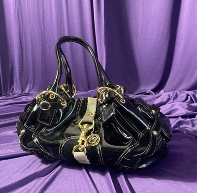 Bolso de mano Juicy Couture de cuero negro vintage Foto 1 de 4