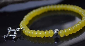 Brazalete Elastizado con Cuentas de Mal de Ojo Vástago Celta Nudo Celta Amarillo Jade 6 mm - Imagen 1 de 4