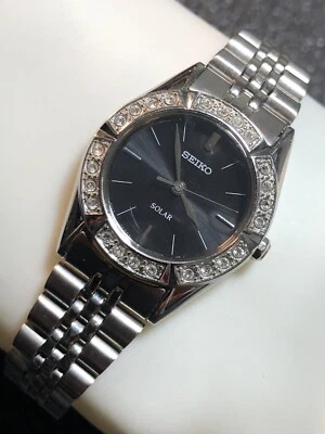 Seiko Solar Ladies Watch Silver Tone Black Dial Gemmed Bezel Women’s Stainless - Image 1 of 4