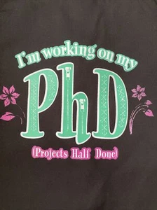 NEW ‘I am working on my PHD (Projects Half Done)‘ Apron Made in USA Chef Gift - Picture 1 of 11