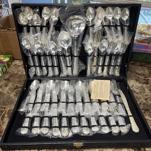 Juego de cubiertos PLATEADO China 48 piezas con BK. FUNDA FLORES NUEVA EN FUNDAS DE PLÁSTICO  - Imagen 1 de 3