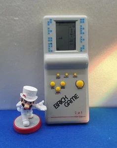 CONSOLA RETRO BRICK GAME 2 IN 1 QGH 33A FUNCIONA - Imagen 1 de 3