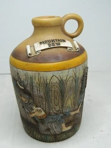 Jarra Moonshine “Mountain Dew” banco de resina Hillbilly Mountains 7”H parte inferior enchufable - Imagen 1 de 8