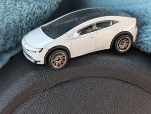 IMPECCABLE DESIGN 2023 TOYOTA PRIUS PRIME PERFECT WHITE CLR 1/64 DIECAST CAR NOC - Picture 1 of 24