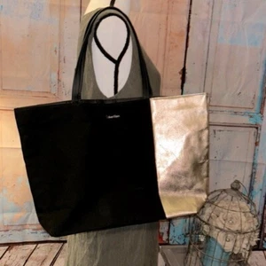 Bolso de Mano Calvin Klein Negro y Dorado Diseño Elegante - Imagen 1 de 8