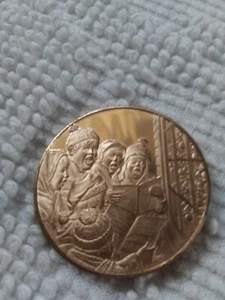 1974 Christmas Seasons Caroling Bronze Coin By Franklin Mint - Picture 1 of 4