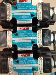 NACHI WET TYPE SOLENOID OPERATED DIRECTIONAL CONTROL VALVES ON MANIFOLD  - Picture 1 of 4