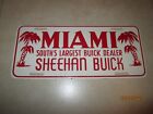 Rare 1950s 1960s Miami FL Sheehan Buick Dealer Booster License Plate Skylark Dodge Power Wagon