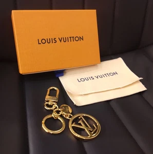 Louis Vuitton M68000 Metal Gold Porte Cles LV Circle Key Chain Bag Charm - Picture 1 of 7