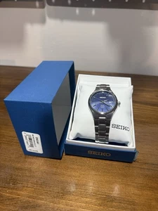 Seiko SNE381 Herren Solar blaues Zifferblatt Datum Titan Uhr - Bild 1 von 1