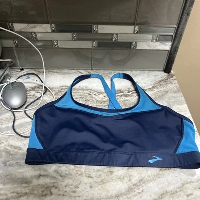 Sujetador deportivo Brooks medio sin cables correa ajustable azul impacto medio Foto 1 de 4