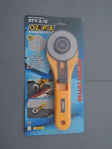 Cortadora de rodillos profesional OLFA RTY-3/G 60 mm hoja de acero para tela papel lámina de cuero - Imagen 1 de 3