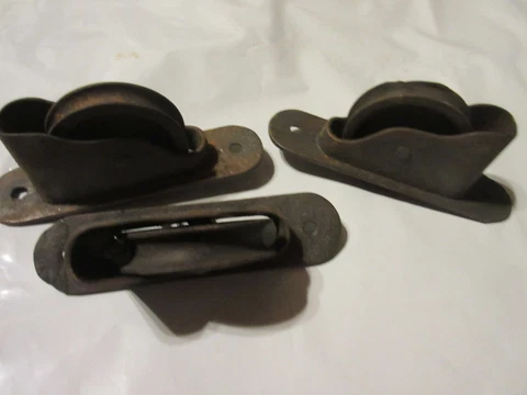 3 window sash pulleys Cover