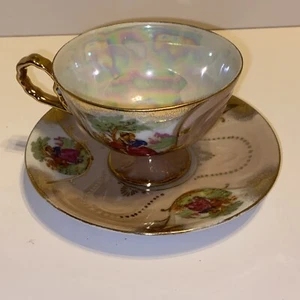 Iridescent Pedestal Courting Couple Teacup & Saucer Pink Heavy Gold - Picture 1 of 11