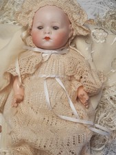ANTIQUE DOLL BABY..REKNIGAL..R A..