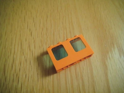 Lego 61345 Orange Window Frame 1 x 4 x 2 with Transparent Blue Glass - Image 1 of 2