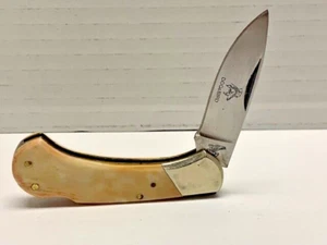 Vintage Frost Japan Bone Handle Lock Back Knife Brass Liner "Dog and Bird" - Picture 1 of 11